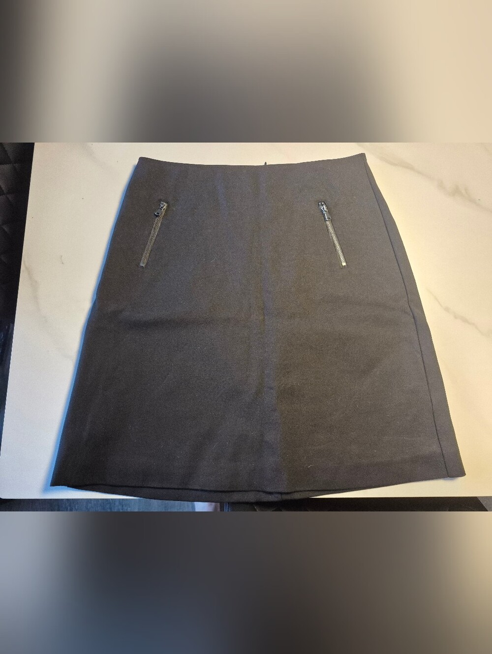 Classic Black Mini Skirt with Zip Pockets